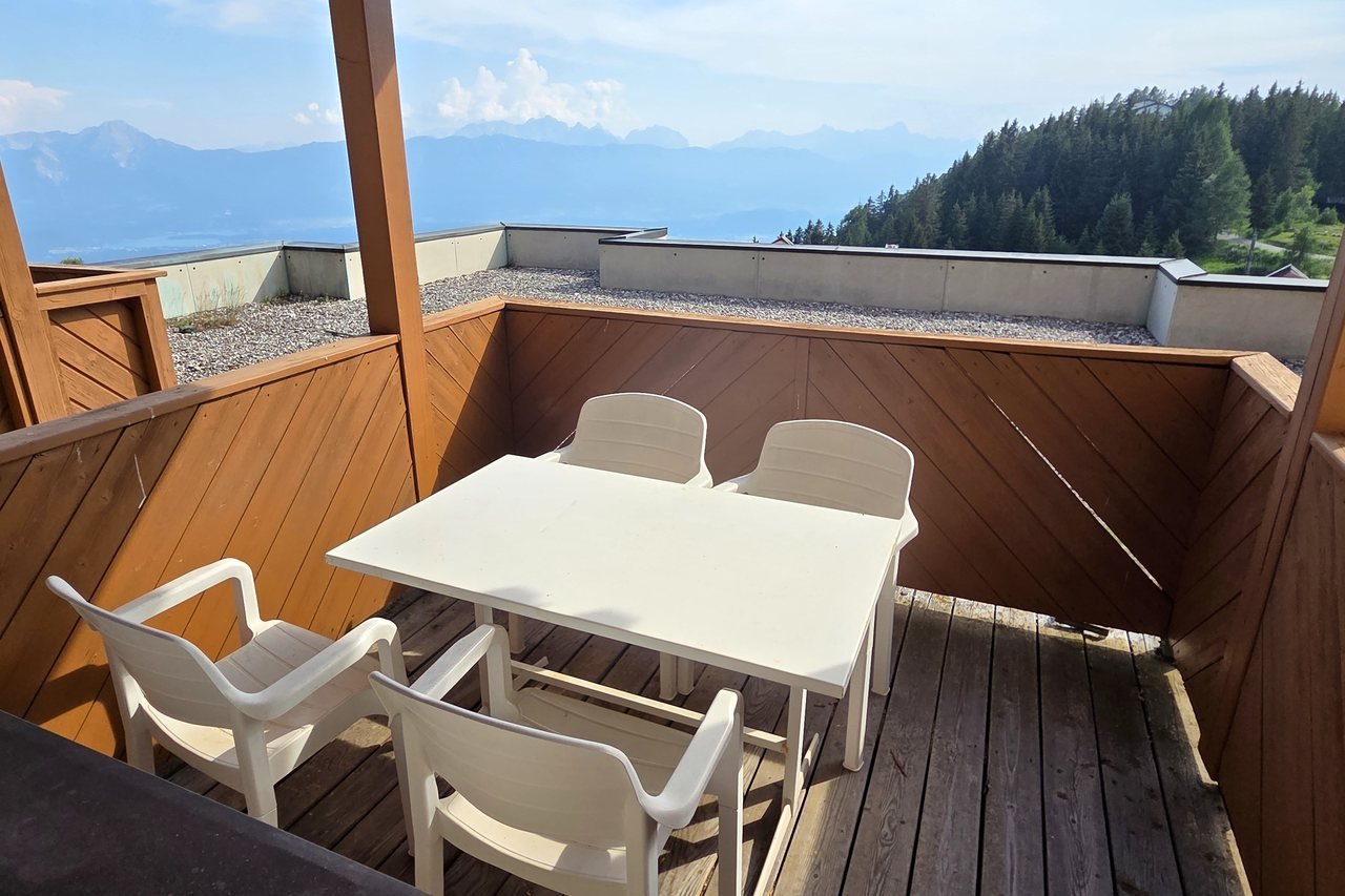 Covered terrace with mountain panorama – Alpenliebe apartment on the Gerlitzen Alpe
