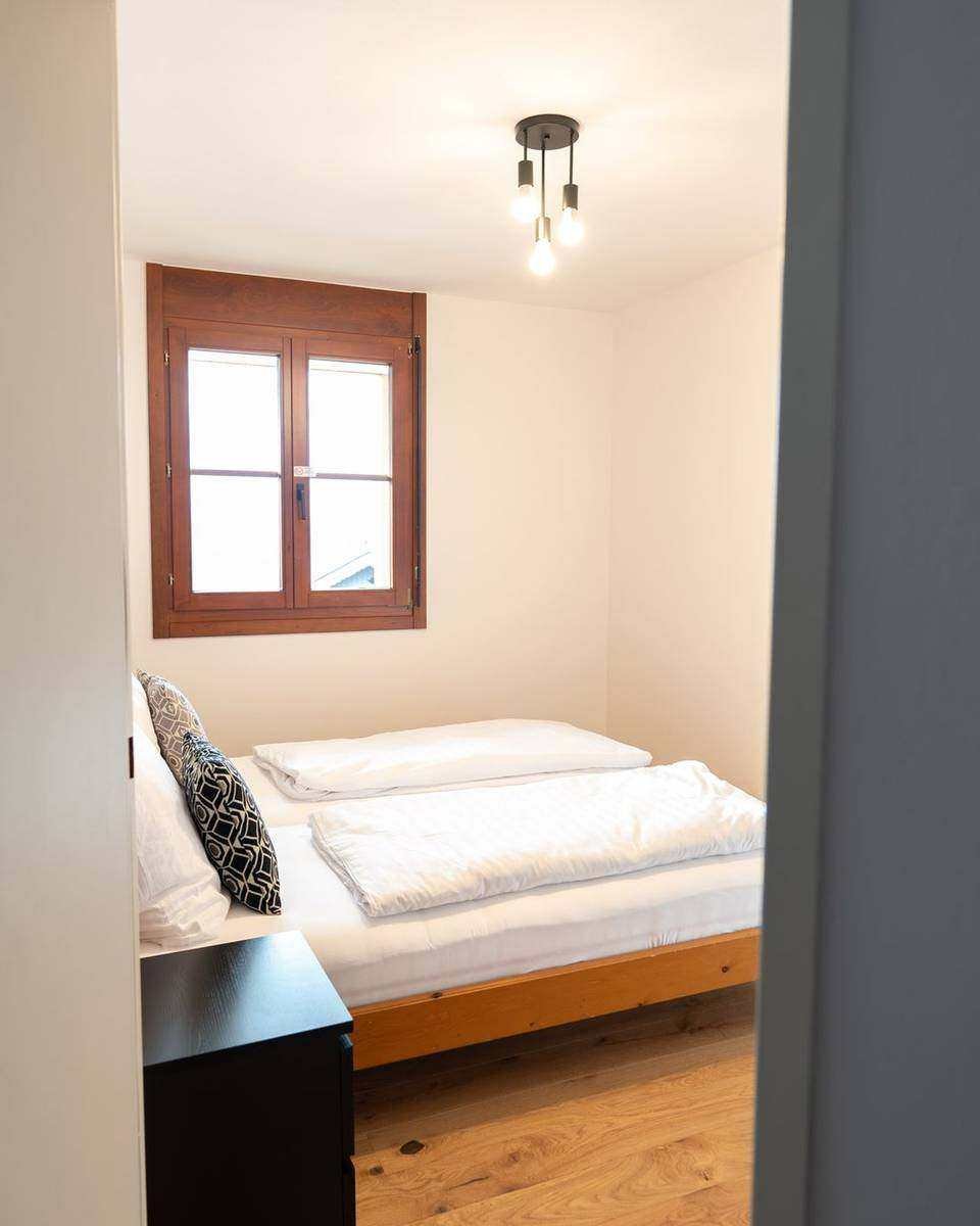 Bedroom with double bed – holiday apartment on the Gerlitzen Alpe