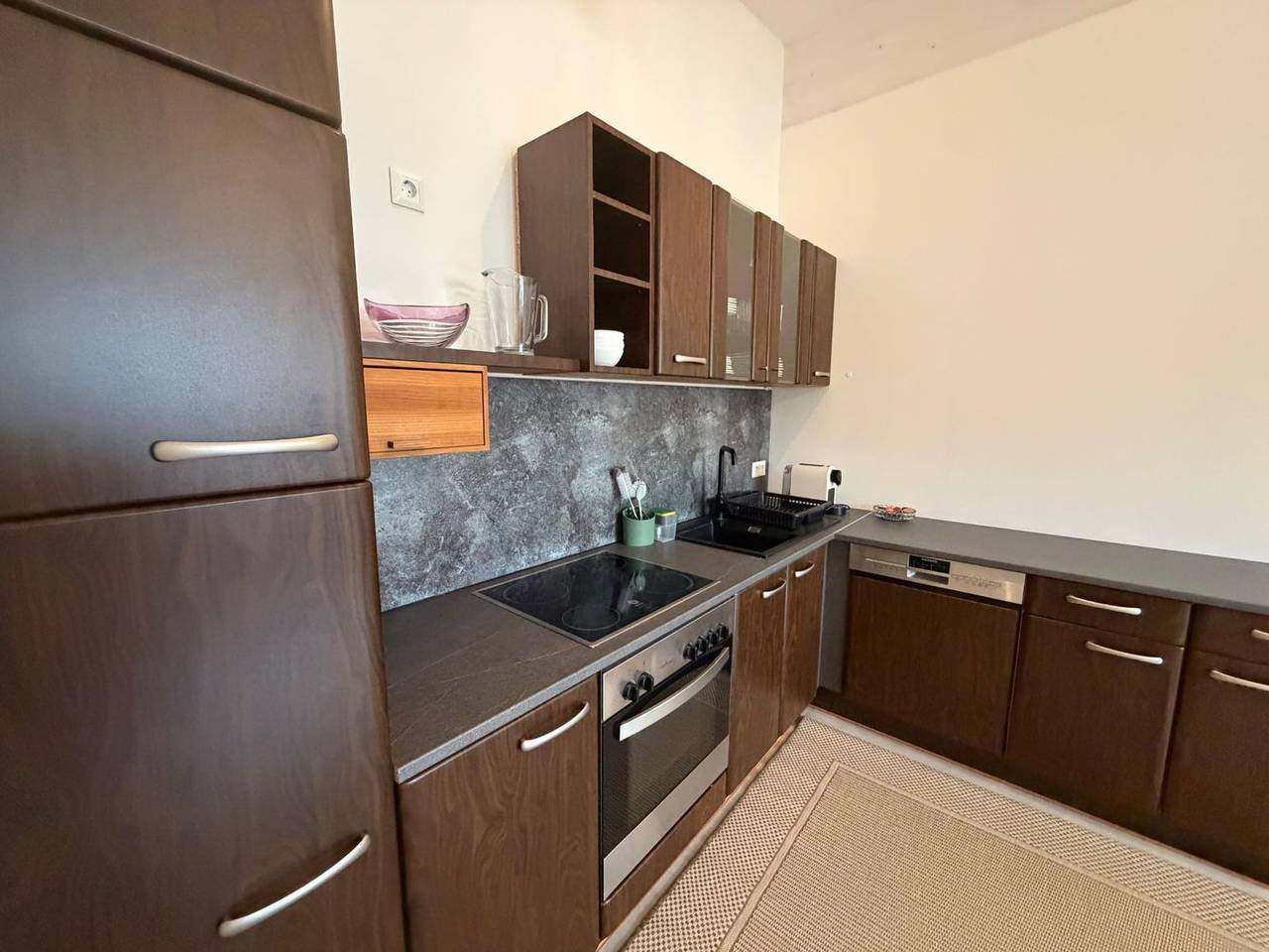 Kitchen with oven, hob and dishwasher – Emy-Lou apartment Luisa-Marie, Maria Saal