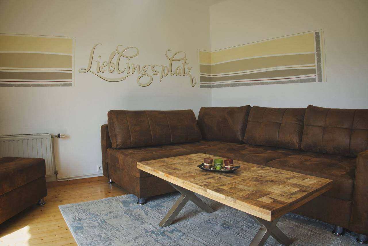 Living room with corner sofa – Gerlitze apartment (upper floor), Sattendorf on Lake Ossiach
