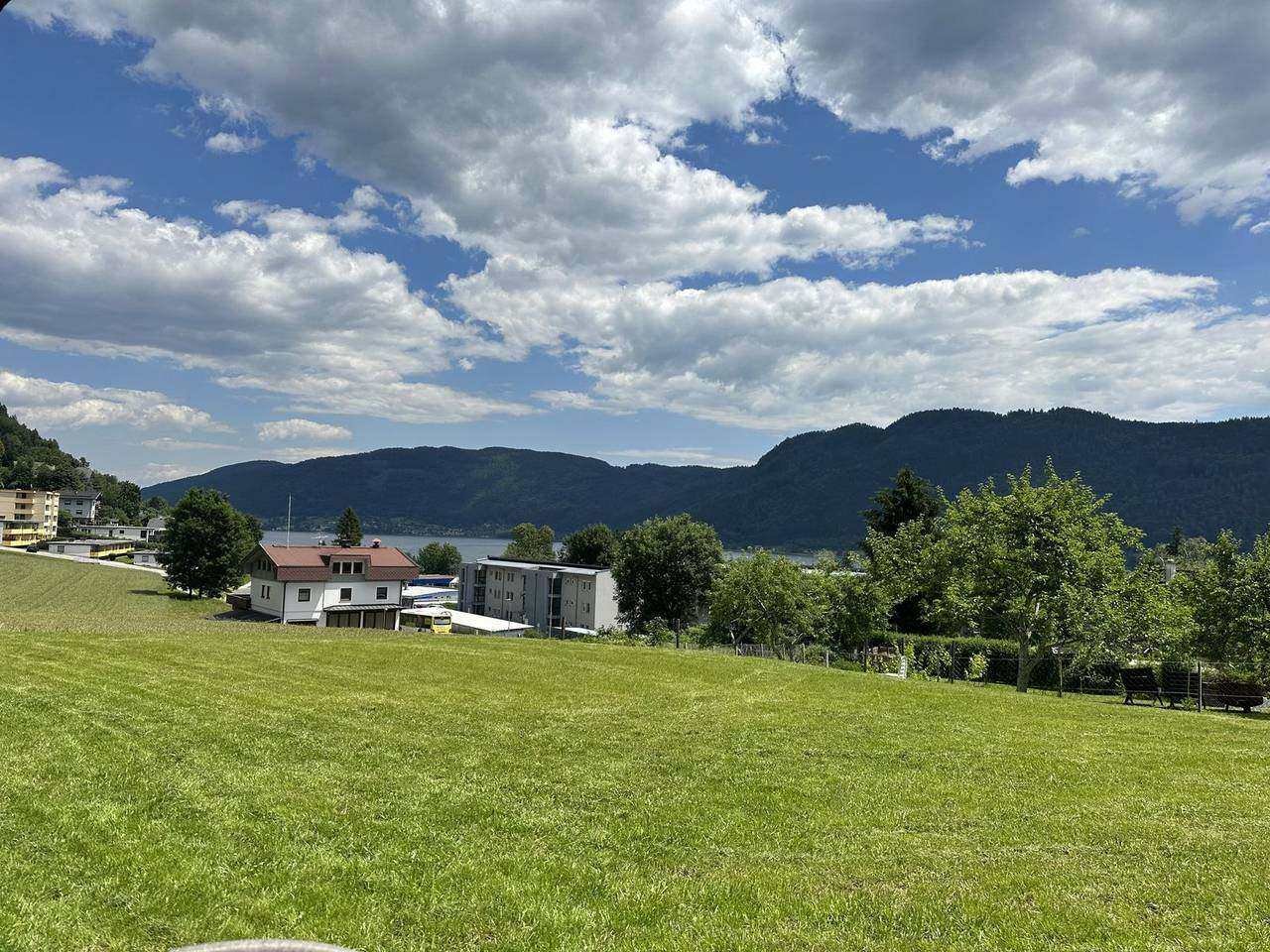Meadow by the house in Sattendorf with views of Lake Ossiach and the mountains